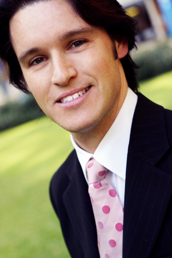 Hypnosis for Winning - Sharp Dresssed Man in Suit Looking Confident